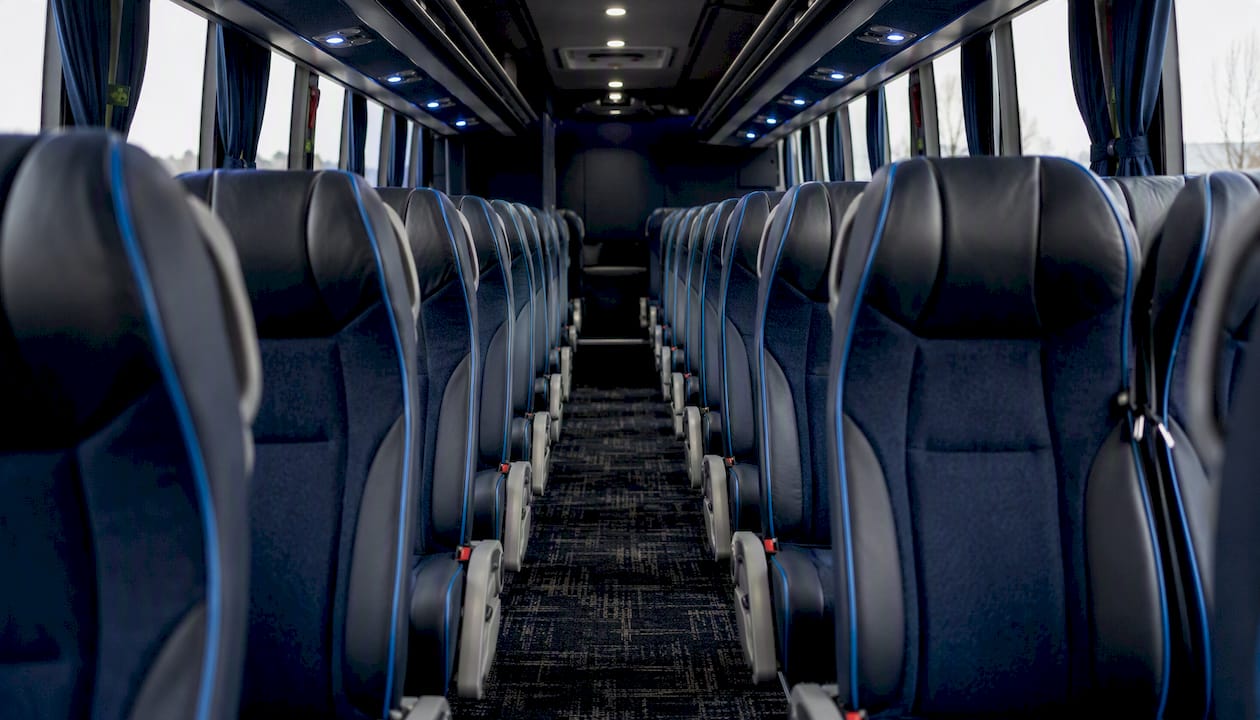 Charter bus interior with 2-and-2 seating