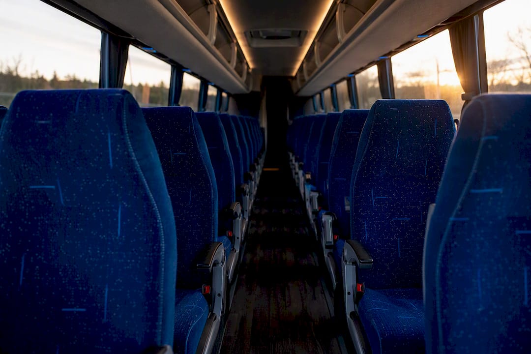 Clean charter bus interior seating row