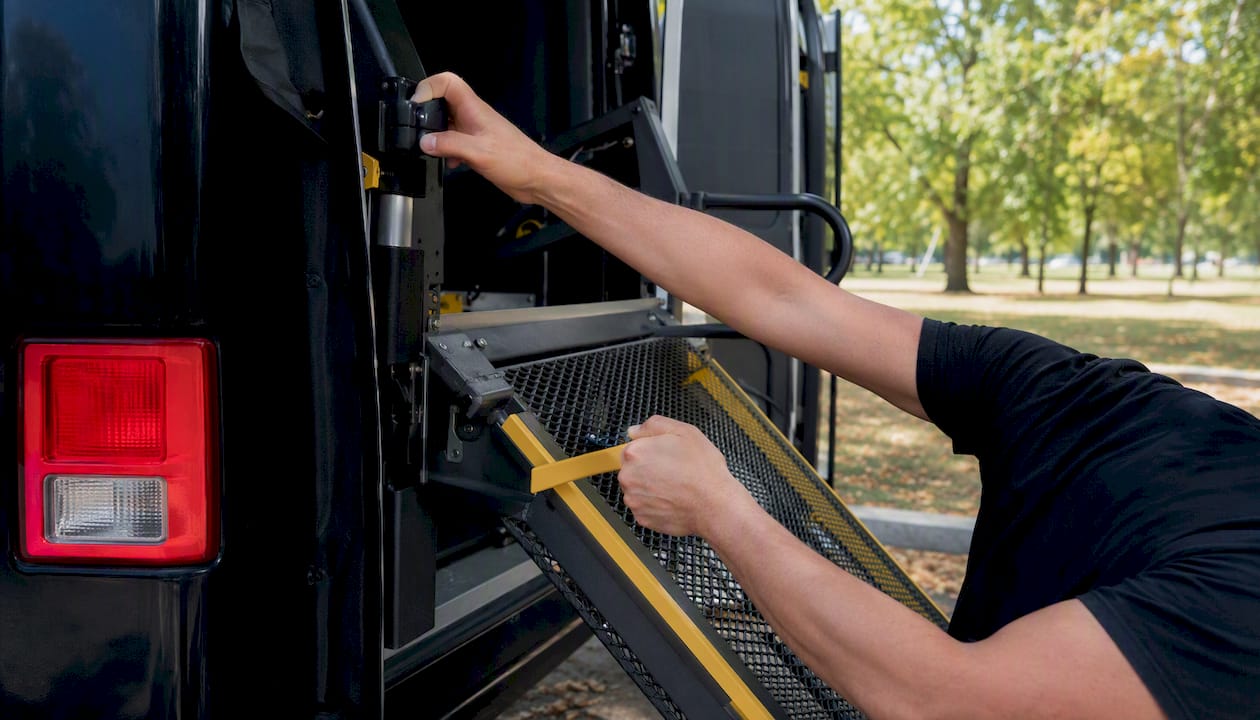 Operator deploying shuttle wheelchair ramp