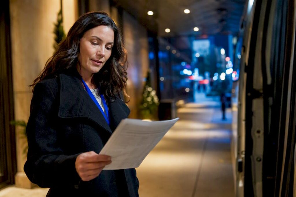 Organizer reviewing holiday shuttle manifest