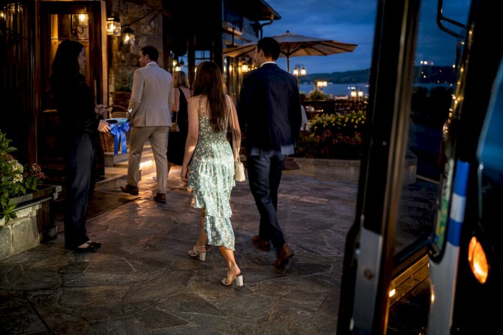 Guests arriving at rehearsal dinner shuttle