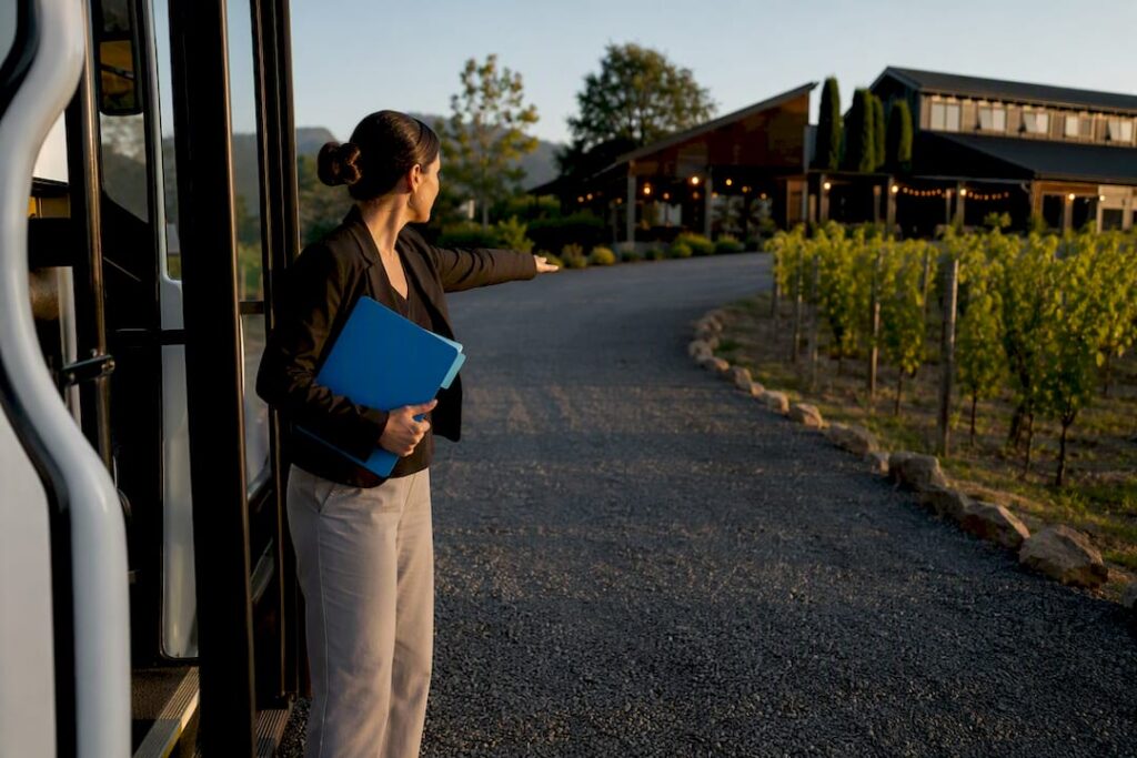 Coordinator checking vineyard venue shuttle access