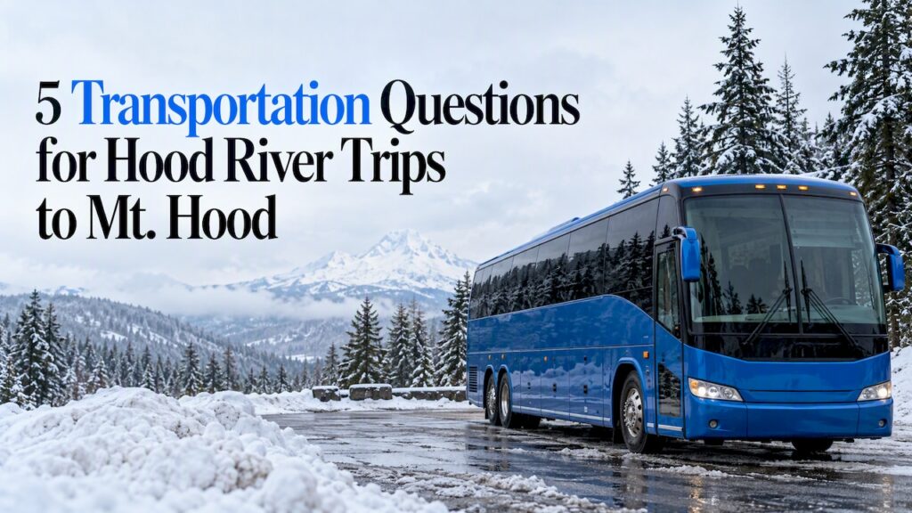 Blue charter coach at a snowy Mt. Hood parking area